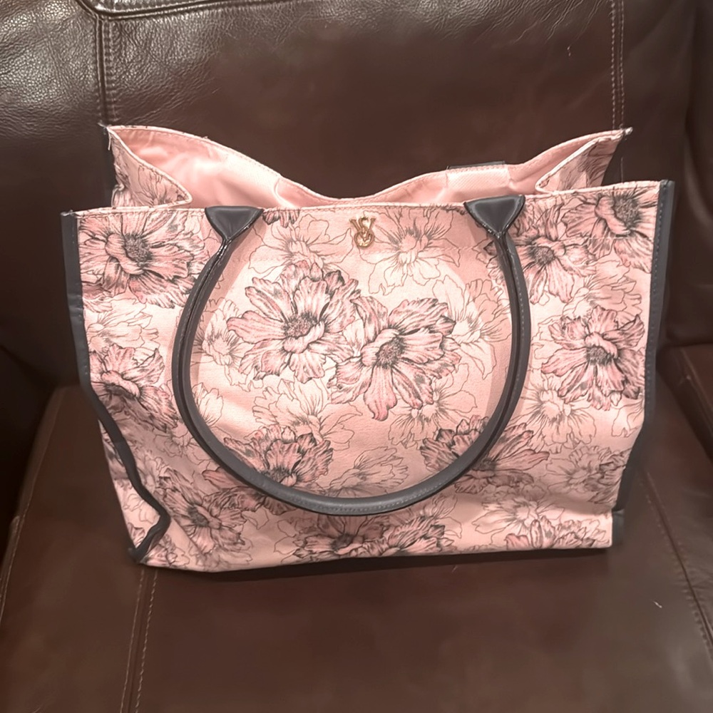 NWOT Victoria Secret canvas tote, pink w/ grey flowers, snap closure.